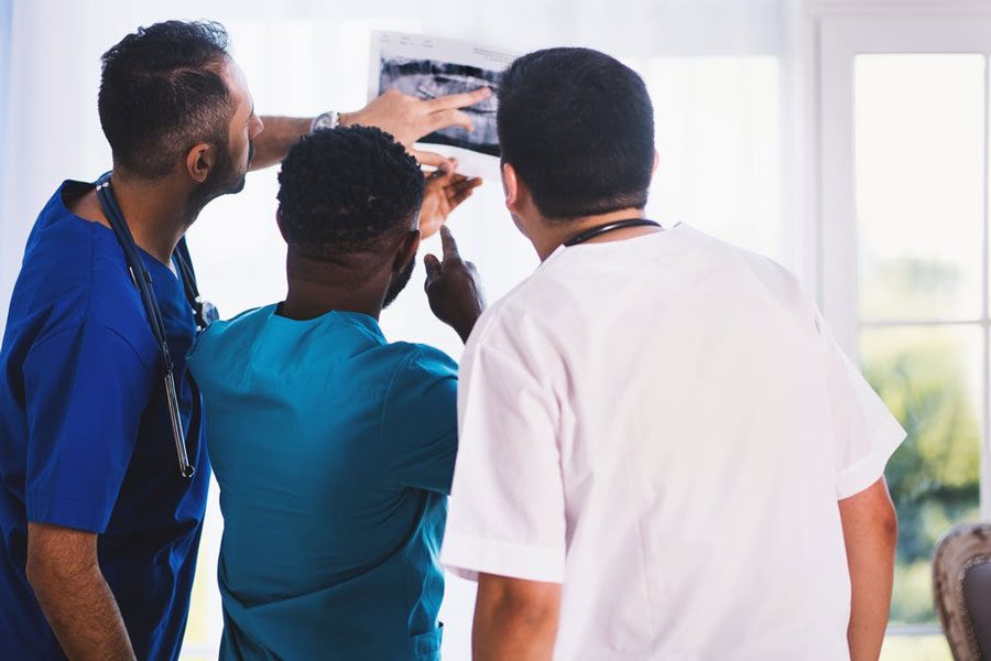 medical team looking at labs